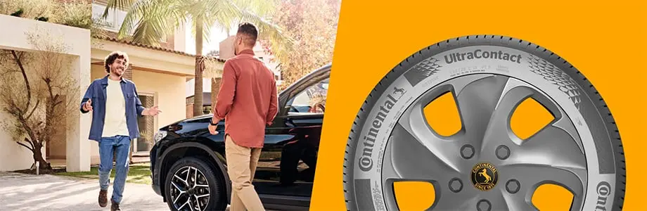 Kierowcy przy samochodzie wyposażonym w Continental UltraContact